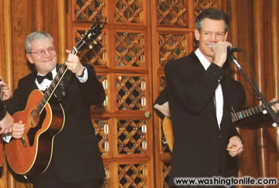 White House Chief of Staff Josh Bolten sits in with Randy Travis on "Forever and Ever, Amen."