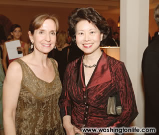 Undersecretary of State Paula Dobriansky and Secretary of Labor Elaine Chao