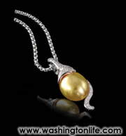 Drop of Gold by Jorge E. Adeler Of Adeler Jewelers