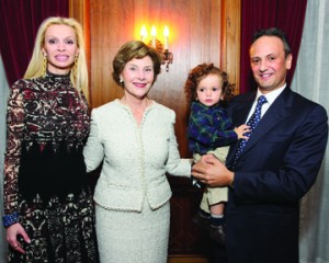 Rima Al-Sabah, Laura Bush, and Salem Al-Sabah holding baby Nasser ‘Nino’ Al-Sabah 
