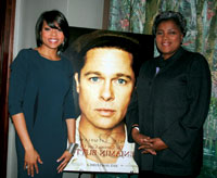  Actress Taraji P. Henson poses with Donna Brazile and a poster of her co-star Brad Pitt at a pre-pre Oscar party at Arcadia.