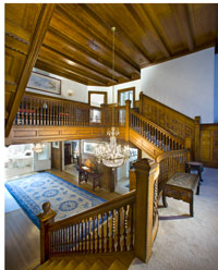 The sweeping staircase at the front of the house with its elegant balustrade