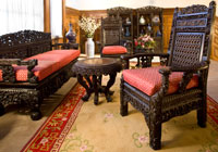 This set of intricately carved rosewood furniture was believed to have been sent by the Empress Dowager of China to the 1904 World's Fair in St. Louis before arriving at Twin Oaks