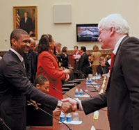 Usher meeting with Rep. George Miller, chairman of the House Education and Labor Committee before testifying on Capitol Hill.