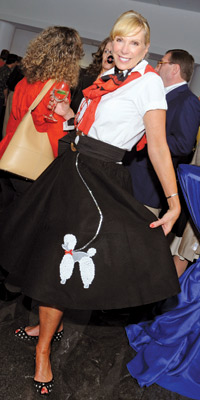 Barbara McDuffie shows off one of the era-perfect poodle skirts seen in the audience at the Lombardi Cancer Center’s Doo Wop Concert at the Warner Theatre.