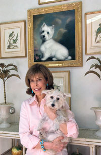 Jane Stanton Hitchcock at home with her beloved Chloe. (Photo by James R. Brantley) 