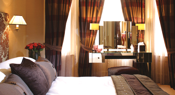 One of the luxurious rooms in the Athenaeum Hotel