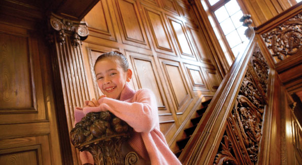 Valentina Pastrana home from her ballet class at The Washington Ballet on the staircase of the residence.