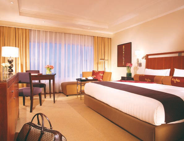 A deluxe room mixes Beijing’s subtle design aesthetic with the Peninsula’s famous luxury.