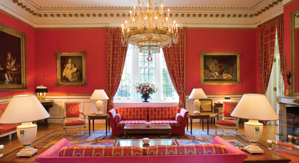 The red "grand salon," one of the masterpieces of the residence, boasts a painting by Bonnard.