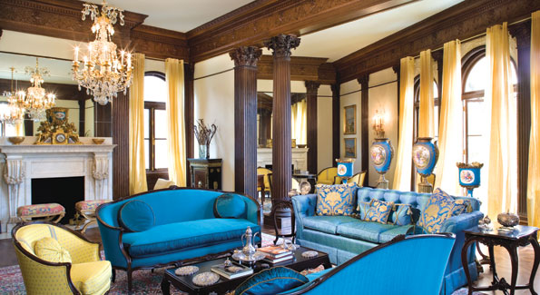 The turquoise and yellow drawing room is now light and airy with silk and linen calm-yellow sheer drapery that let sunlight flood the room. The light also highlights the exquisite antique Serves vase collection - a main reason why turquoise has become "the new neutral" for the mansion.  Note also the Ambassador's antique silver collection crafted by Turkish silversmiths in Istanbul. 