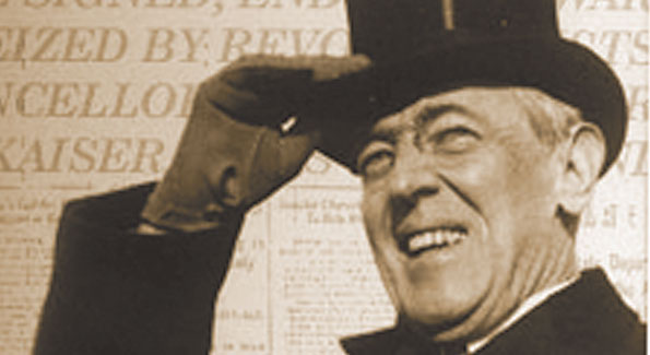 President wilson smiling as WWI comes to an end.
