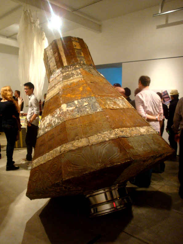 Opening Night Reception. Jefferson Pinder, Capsule - 2009. Wood from Obama's inauguration platform. salvaged tin. 