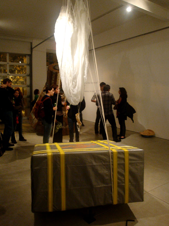 Opening Night Reception. José Ruiz, The Gods Must Be Crazy (Humanitarian Aid Drop) - 2009, Mixed Media Sculpture