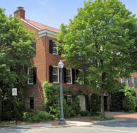 The Federal-style townhouse at 3400 R Street NW has been the site of many VIP gatherings.