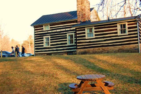 The log cabin which houses Paradise Springs Winery dates back to the 1800s and Lord Fairfax days. Photo by John Arundel