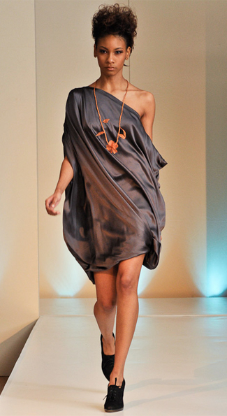 Designed by TATA, a sexy silk off the shoulder dress graced the runway.