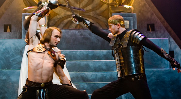 Marc Antony (Ben Cunis) dmoinates an Egyptian temple/throne room scene with the help of swordsmen Scott Brown (left) and Matthew Ward (right)