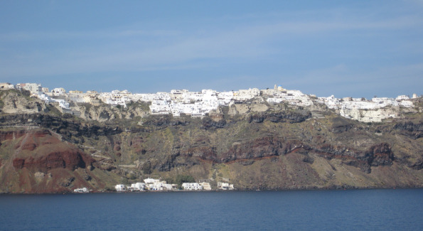 View of Santorini's White Villas from the Mediterranean