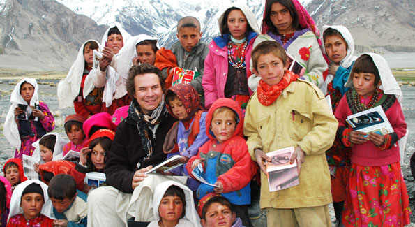 Greg Mortenson with Sitara "Star" Schoolchildren in Afghanistan. (Image courtesy Central Asia Institute)