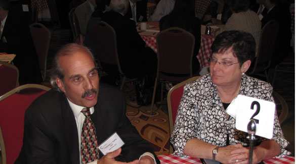 Tom Raffa, pictured with Jeanne Sanders from Volunteer Fairfax, challenges medium-sized businesses to engage more fully with nonprofits. (Photo courtesy of America's Charities)