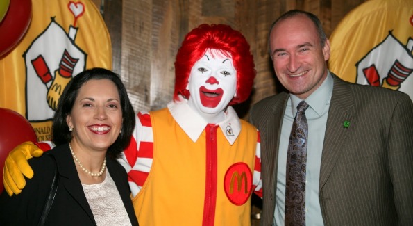 Dennis and Nina Prescott strike a pose with Ronald McDonald. Photo Courtesy of Ronald McDonald House.