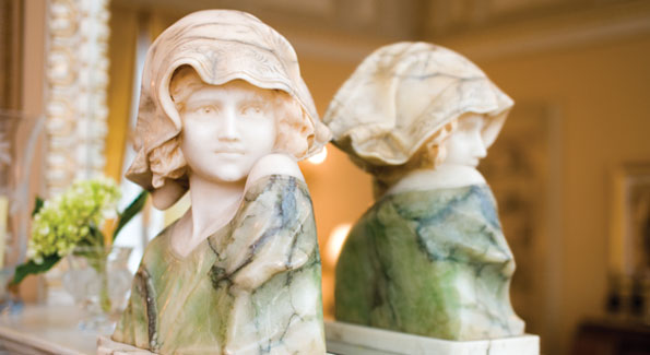 This 19th-century marble bust is reflected in detail on a mirrored mantlepiece. Photos by Joseph Allen.
