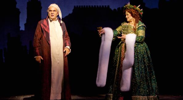 Edward Gero as Ebenezer Scrooge and Anne Stone as the Ghost of Christmas Present in the 2009 Ford’s Theatre production of Dickens’s “A Christmas Carol,” directed by Michael Baron. Photo by T. Charles Erickson.