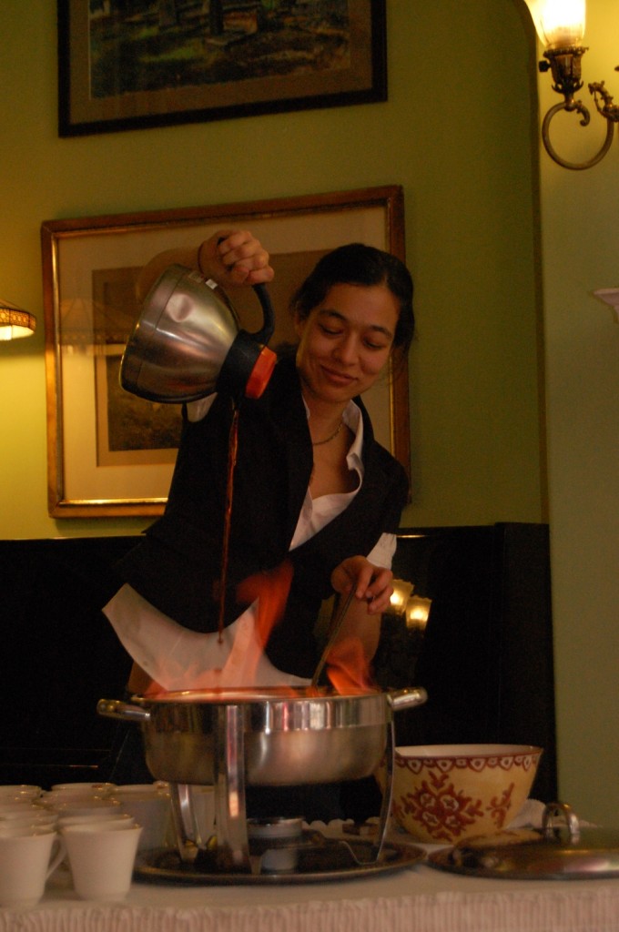 Chantal Tseng mixes the flambeed Cafe Brulot.