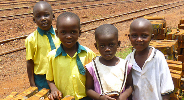 Children at the Jinja railway station in Uganda, photo by John Hanson