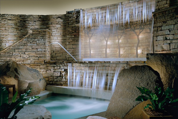 The interior pool and Jacuzzi features hydro waterfalls.