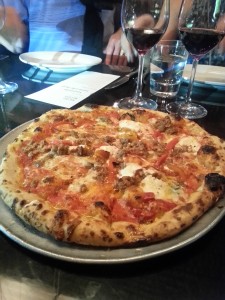 The sausage and fennel wood-fired pizzas is a menu highlight at Redd-Wood. Photo courtesy of Kelly Magyarics.
