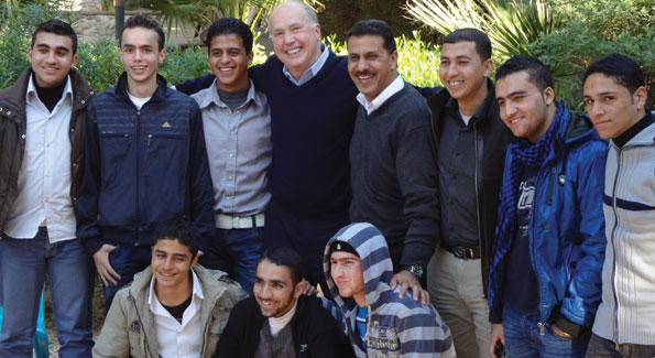 With CMBM Gaza program director Jamil Abdel Atti and youth group, Gaza City, 2010. (Photo courtesy Dr. James S. Gordon)