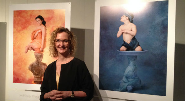 Anne Geddes with portraits from "Protecting Our Tomorrows: Portraits of Meningococcal Disease." (Photo by Erica Moody)