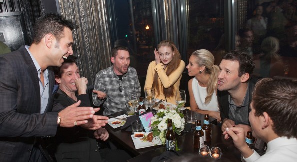 WASHINGTON, DC - APRIL 24:  (L-R) Eric Podwall, JC Chasez, Bryan Singer, Sophie Turner, Candice Crawford, and Tony Romo attend "The Evening Before"- a pre-White House Correspondents' Dinner party hosted by Eric Podwall and Spotify at Chaplin's Restaurant on April 24, 2015 in Washington, DC.  (Photo by Teresa Kroeger/Getty Images for Eric Podwall)