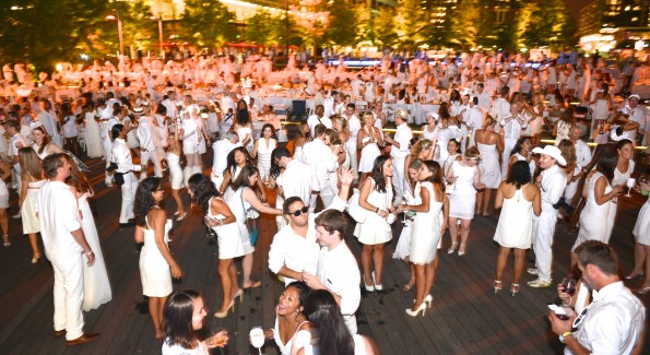 The global phenomenon secret dinner party, Diner en Blanc, attracted over 1,300 guests all wearing white.  (Photo by Ben Droz)