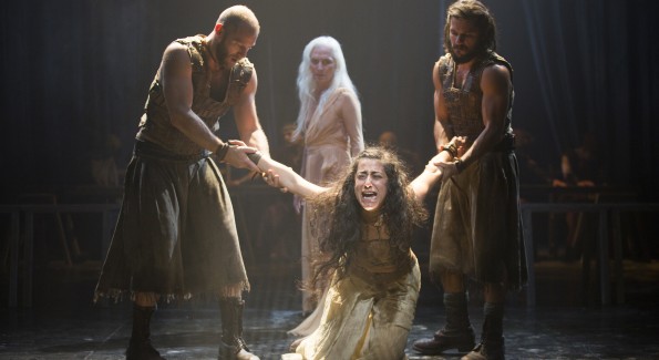 Foreground, from left: Elan Zafir as Abaddon, Nadine Malouf as Salomé, and Shahar Isaac as Bar Giora, with Olwen Fouéré, background, as Nameless Woman in Yaël Farber’s Salomé at the Shakespeare Theatre Company. (Photo by Scott Suchman)