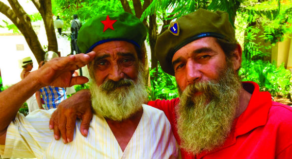 Cuba men saluting