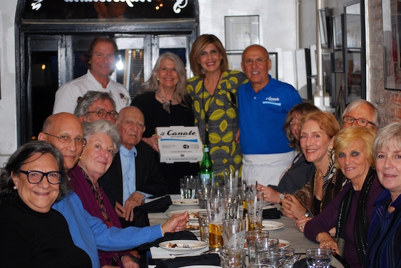 Gennaro Luciano (far left), Joe Farruggio (far right), his wife Teresa, and family members celebrate the partnership of Il Canale and Antica Pizzeria Port' Alba.