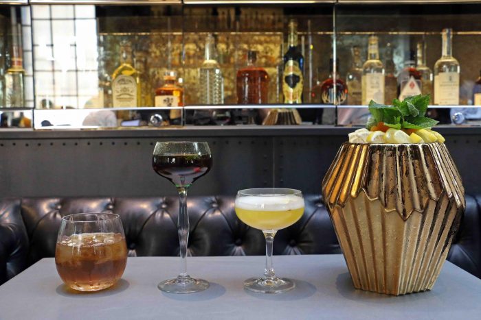 Dirty Habit's cocktails, including the large-format (far right) to be shared among friends.