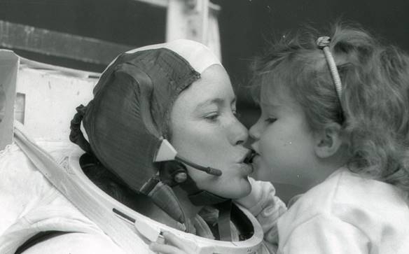 Kristin kissing her mother Anna Lee Fisher